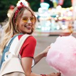 Image,Of,Smiling,Young,Woman,Wearing,Girlish,Clothes,Eating,Sweet